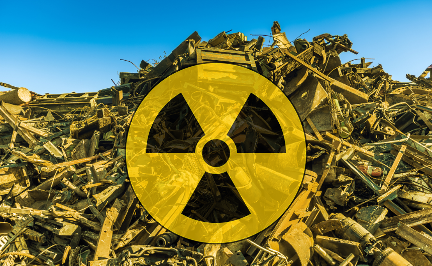 Heap of scrap metal tinted in yellow with a radiation sign over the top